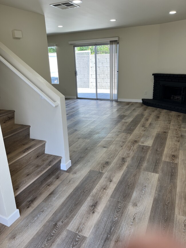 Living room w/gas fireplace - 540 W Lambert Rd