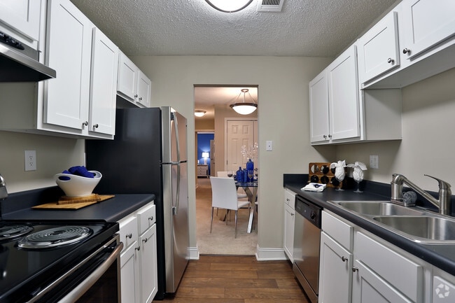 Brand New white cabinets with nickel finishes and stainless steel appliances elevate your lifestyle - Sterling Bluff