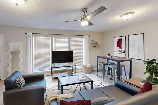 the-social-block-apartment-homes-for-rent-starkville-ms-39759-virtually-staged-4x2 Signature Renovated-living-room - The Social Block