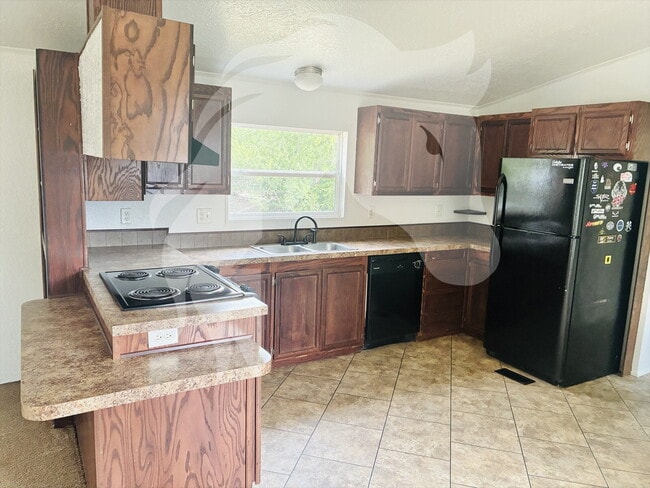 Building Photo - "Spacious 3-Bed Oasis with 2 Full Baths in the Heart of Woodward!"