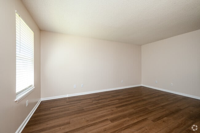 2BR, 1BA - 792SF - Living Room - Meadowbrook Apts REO