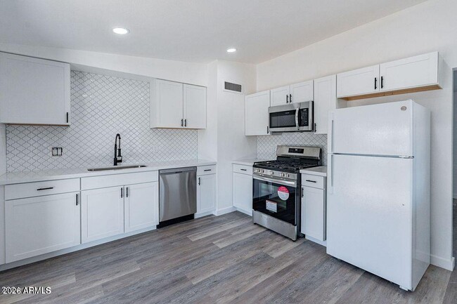 Foto del edificio - 11107 W Iowa Ave