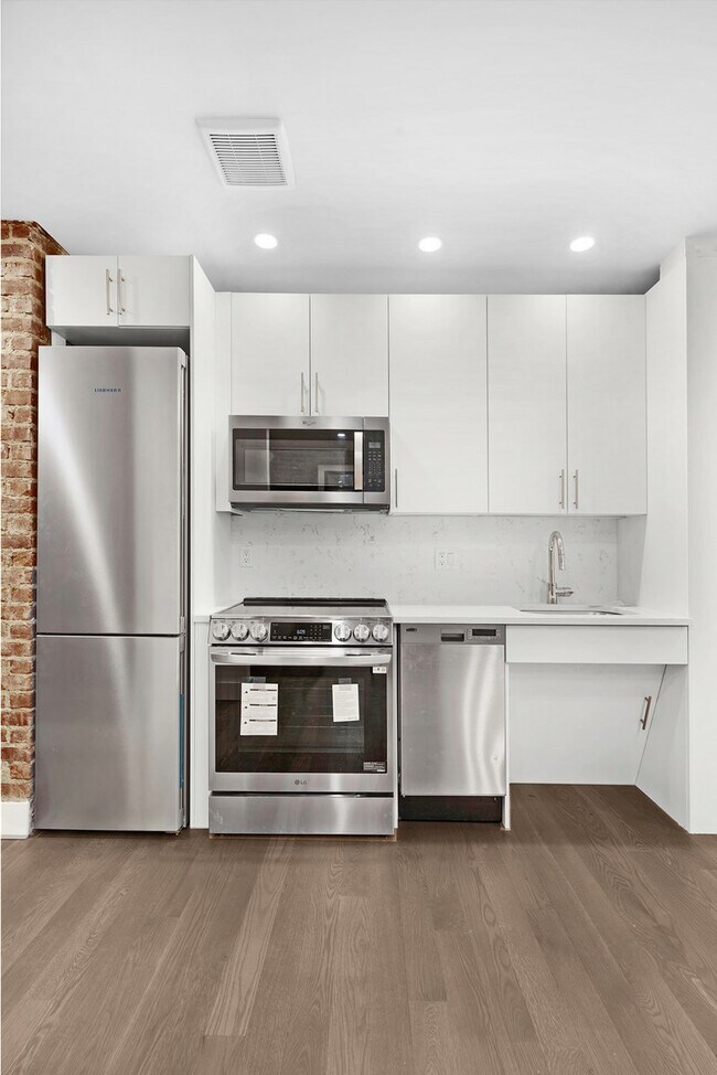 Building Photo - 37-55-55 77th St