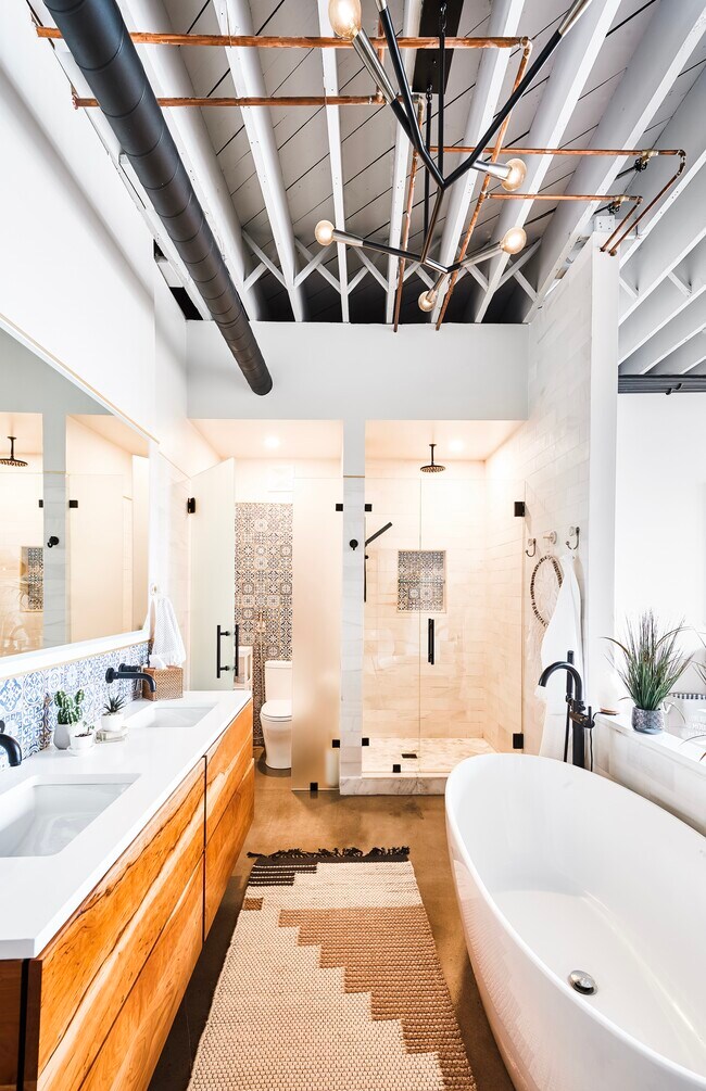 Master bathroom with soaking tub, beautiful tile and floating locally made vanity - 2987 Franklin St