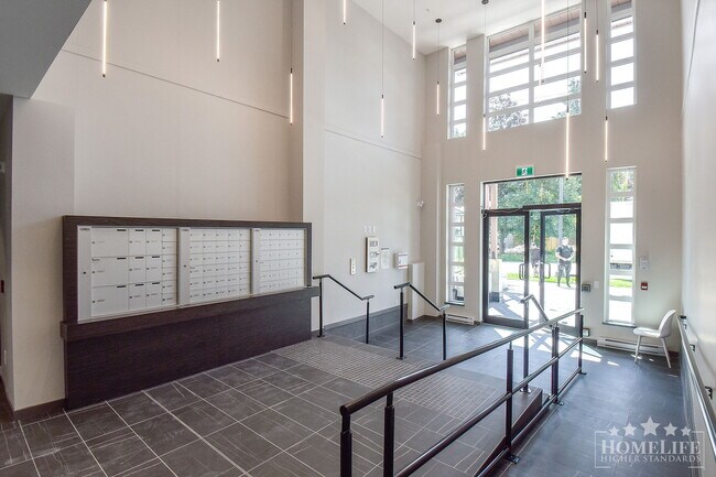 Photo du bâtiment - Modern 2 Bed, 2 Bath Condo in Surrey – Pro...