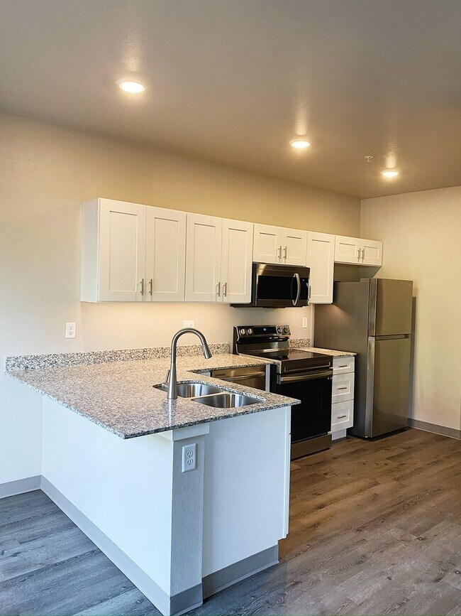 Aster Village Three Apartments in Tiffin, IA