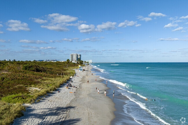 A beautiful sunny view down the Dania Beach shoreline.