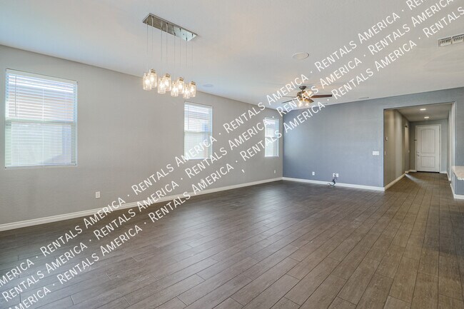 Building Photo - 10910 E Calypso Ave