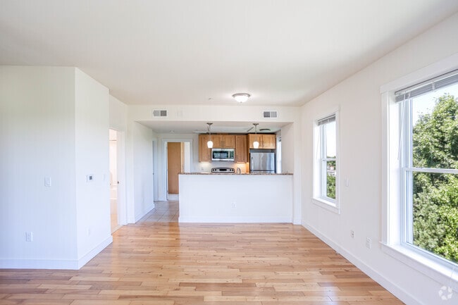3BR, 2BA - 1175SF - Living Space & Kitchen - Park87 Apartments