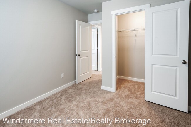 Building Photo - 4 br, 2.5 bath House - 8441 63rd St NE