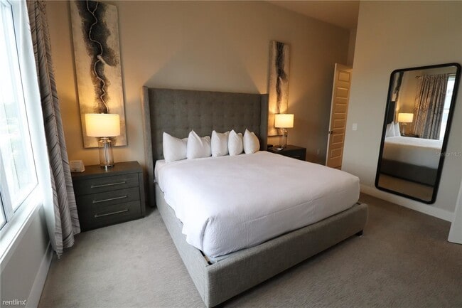 Foto del edificio - 4 br, 3.5 bath Condo - 7740 Sandy Ridge Dr...