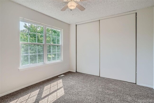 Building Photo - 10569 W Dartmouth Ave