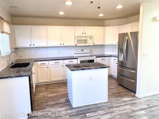 Building Photo - 4 br, 4 bath House - 4808 S. Danube Way