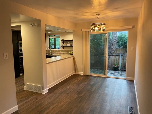 Dining Room to Patio and Kitchen - 671 Shooks Ln