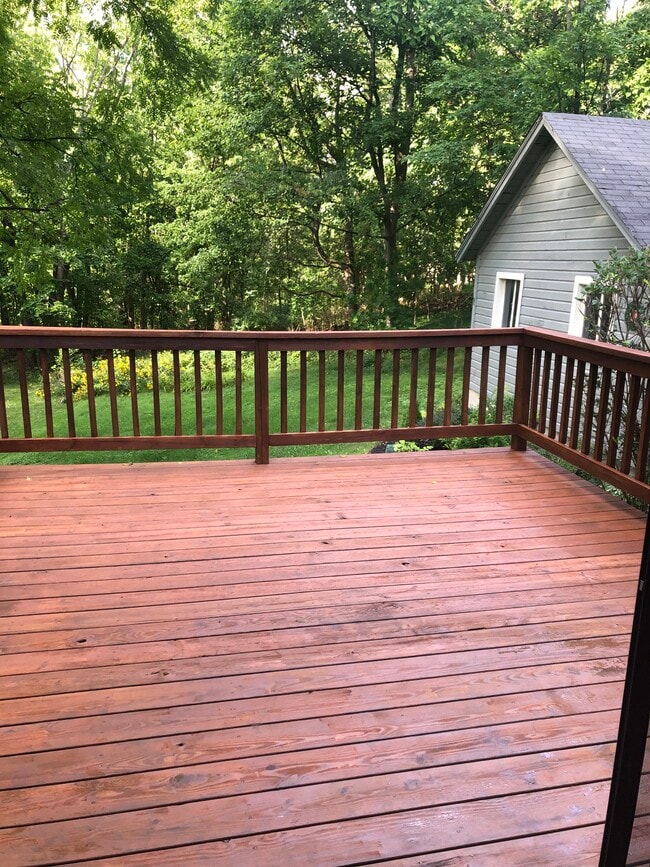 Deck off the kitchen makes for easy grilling, dining and entertaining. - 11 Kellogg St