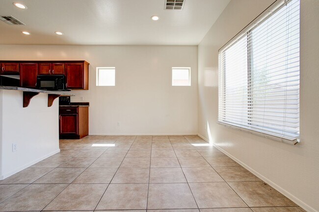 Building Photo - 4 Bedroom in Tolleson.  Landscaping redone.  Newer Carpet, Available February 1st!!!  Great 2 sto...
