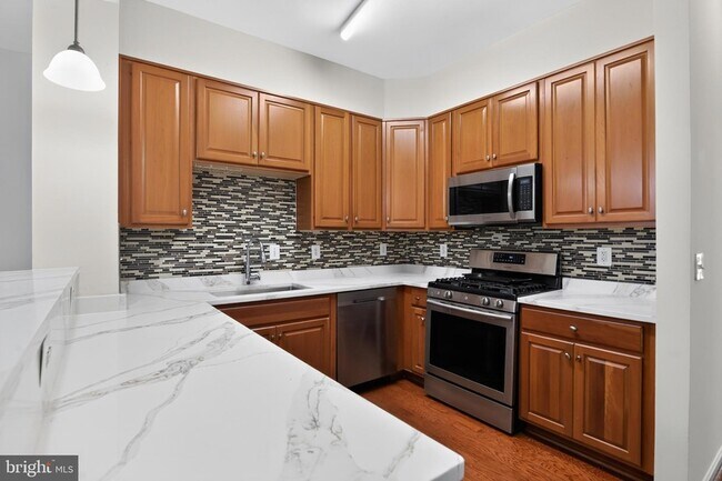 Foto del edificio - 13945 Hollow Wind Way
