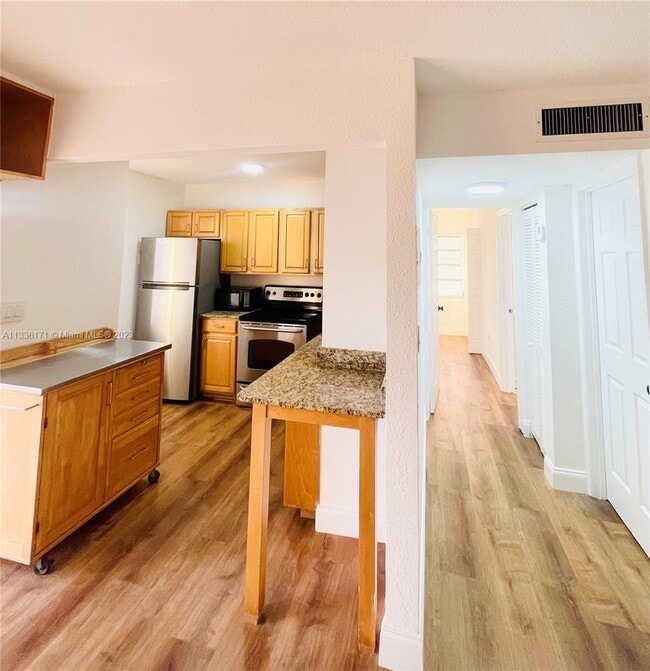 Building Photo - 6444 Collins Ave