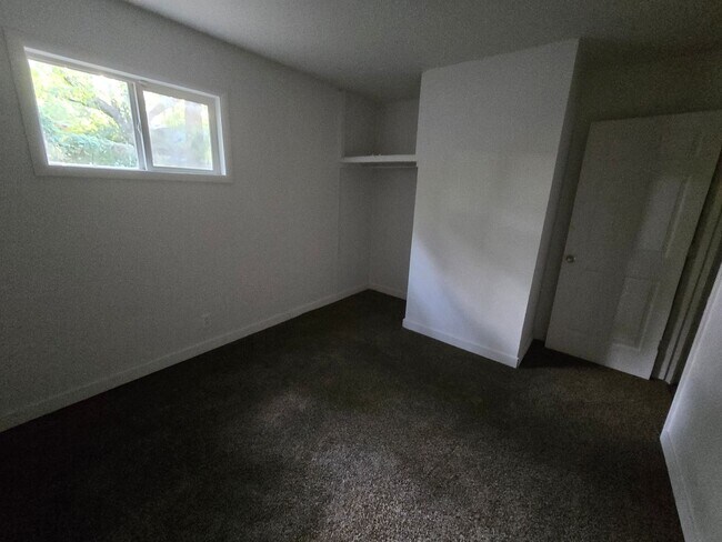 Building Photo - 3 bed 1 bath W/ back yard bunker!