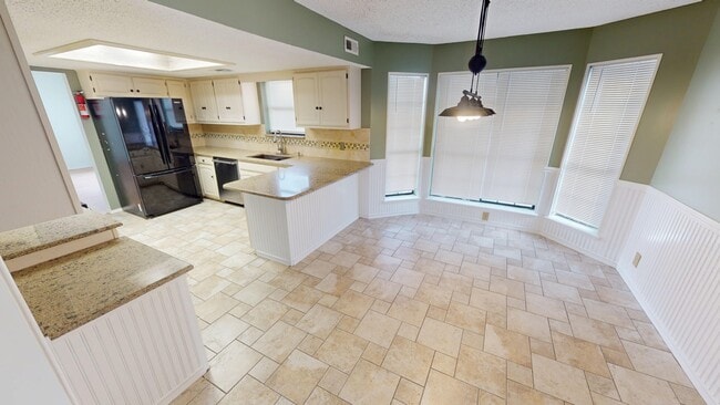 Building Photo - 7535 S Trenton Pl