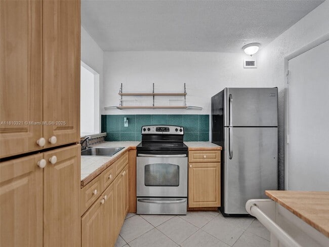 Building Photo - 8233 Harding Ave