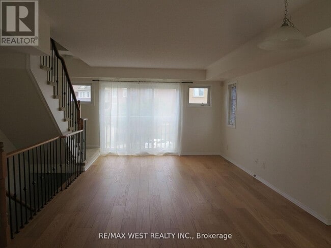 Building Photo - 5615 Oscar Peterson Blvd