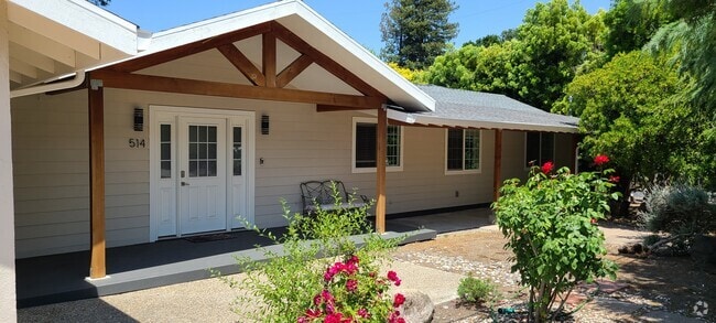 Main door with TREX Deck & Cedar Gables - 514 Osborn Ln