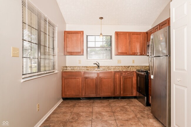 Building Photo - 4002 Harmony Dr