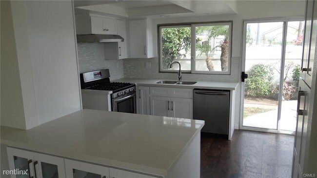 Building Photo - 3 br, 3 bath House - 24956 Beachwalk Way