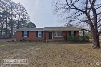 Building Photo - 6047 Lexington Dr