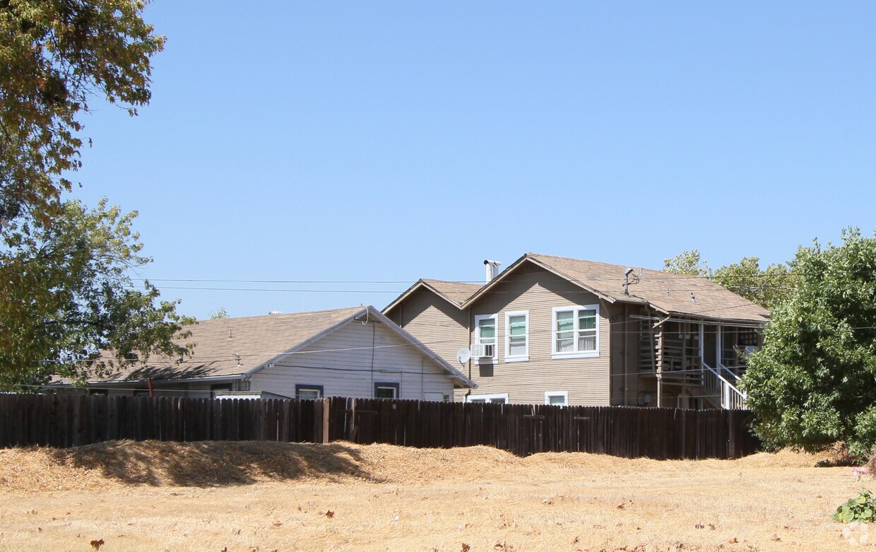 Building Photo - 5 Apartment Units and 2 Storage Sheds