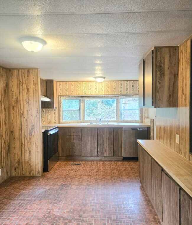 Building Photo - Gurol (11212 Rhody Dr #1)