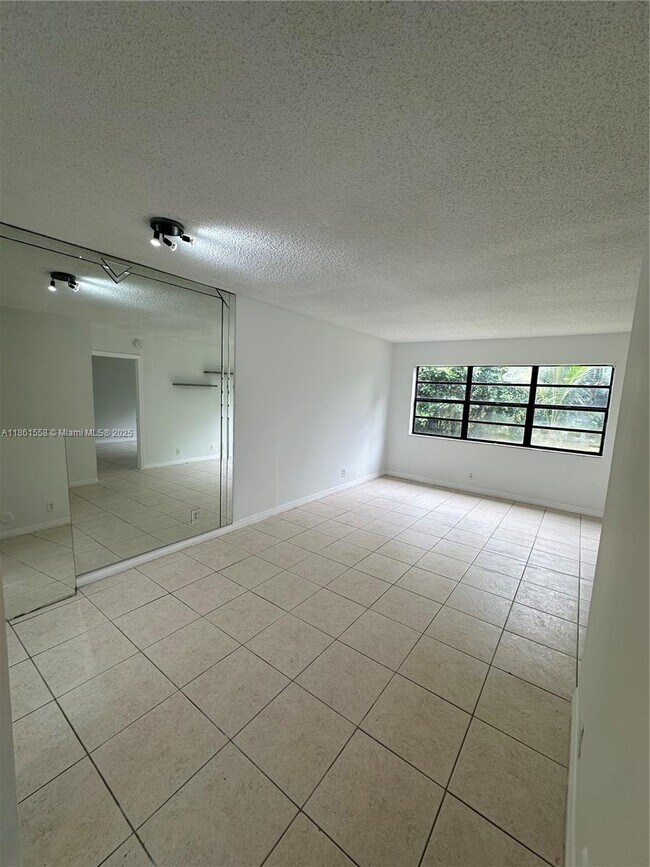 Building Photo - 11213 Royal Palm Blvd
