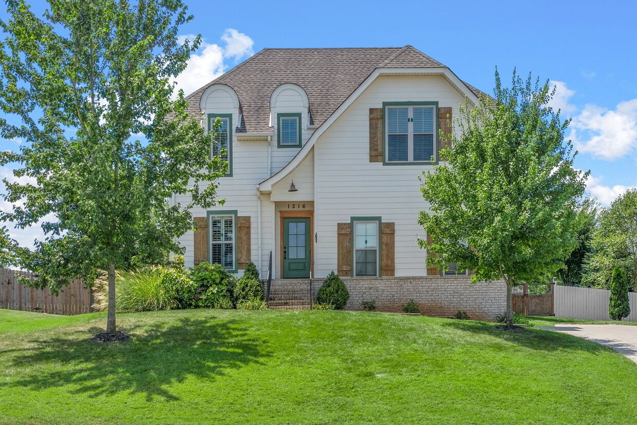 Primary Photo - Elegant 4-Bedroom Home with Vaulted Ceilin...