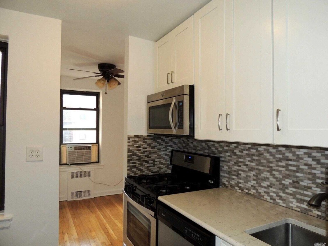 Foto principal - 105-20 66th Ave