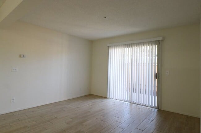 Building Photo - Cozy Condo with Private Patio & Resort-Style Amenities