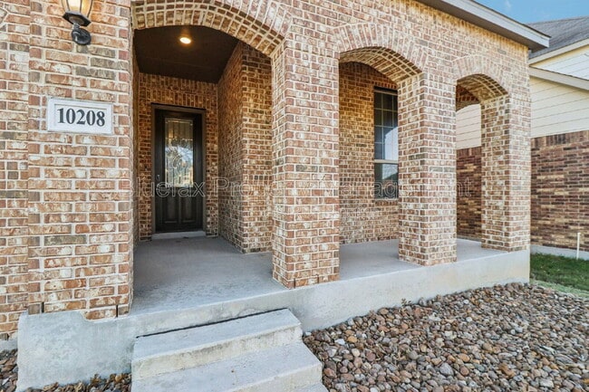 Building Photo - 10208 High Noon Dr