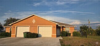 Building Photo - 1319 Nelson Rd N