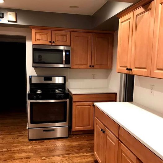 Quartz countertops and stainless gas range. Tons of cabinets. There is also a small pantry in the laundry area. Lower cabinets have pull out drawers that are very convenient. - 2814 N Saint Paul St
