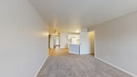 Located at 3775 Allerton Pl in Indianapolis, Indiana, this single-story home offers three bedrooms and three full bathrooms across a well-organized floor plan. The open-concept living and dining area flows seamlessly into the kitchen, creating a connected and functional common space. Soft carpet covers the living area, while light wood-tone flooring extends through the kitchen and hallways. A ceiling fan adds comfort to the main living zone, and a large window at the front of the home allows natural light to fill the entryway.

The kitchen is bright and clean, featuring white shaker-style cabinetry, marble-look countertops, a classic subway tile backsplash, and white appliances including a refrigerator and dishwasher. Ample cabinet storage lines the walls, making the kitchen both practical and visually cohesive.

Each of the three bedrooms is carpeted and includes windows with blinds that allow for natural light and privacy. The primary bedroom is generously proportioned and features a ceiling fan with light fixture. The additional bedrooms offer comfortable space with neutral tones throughout.

The three bathrooms include combination tub/shower units and vanities with white cabinetry, light countertops, and wood-look flooring. A dedicated utility room and two closets round out the functional layout of this move-in ready home.