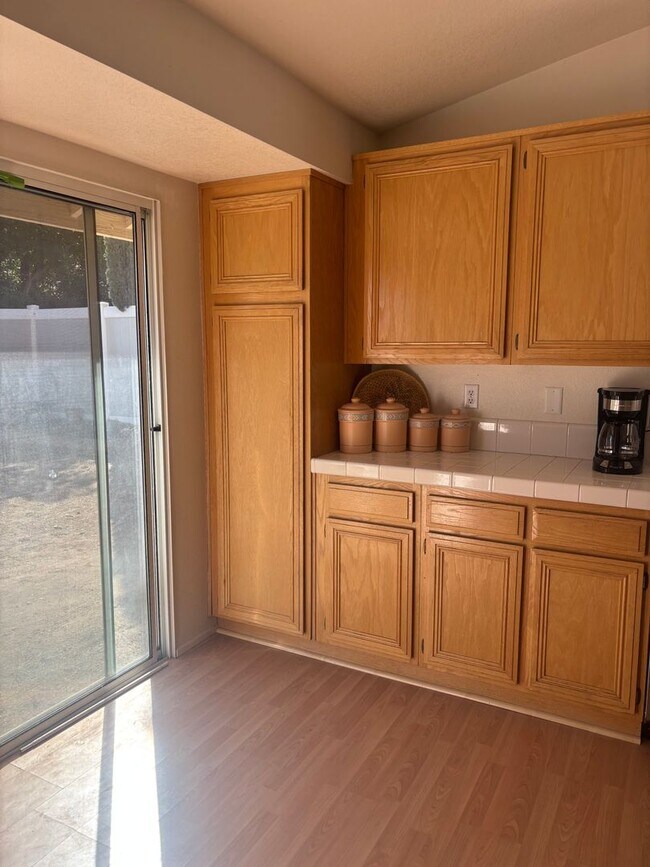 Building Photo - A $200 Move-In Special!  4-BedroomSpacious Home
