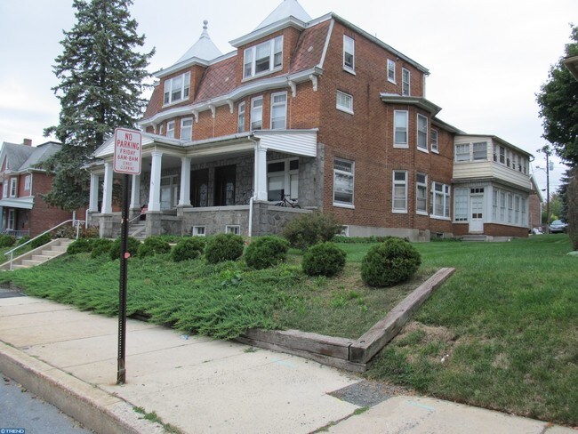 Front porch and side yard - 149 E Main St
