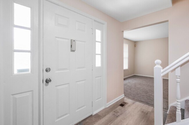 Building Photo - Spacious 4 BR/2.5 BA Single-Family Home in...