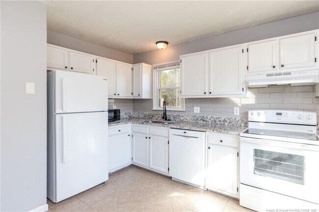 Foto del edificio - 1000 Tyler Dr