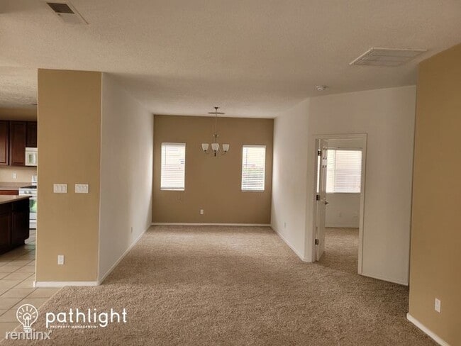 Building Photo - 5 br, 3.5 bath House - 7124 Cuchillo Road ...