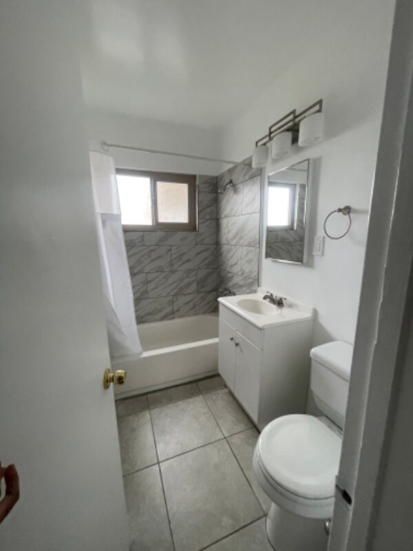 Foto del edificio - 8619 Belford Ave