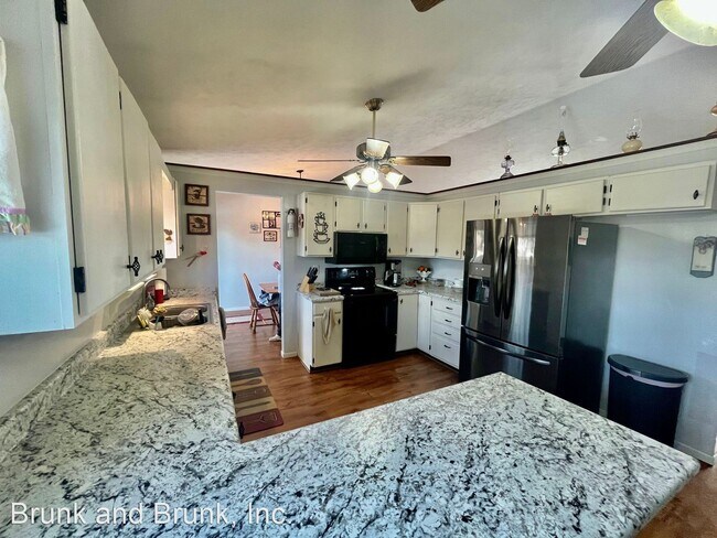 Building Photo - 4 br, 2.5 bath House - 5150 Bunk House Lane