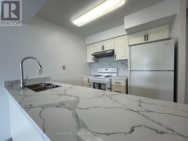 Building Photo - 28-628 Empress Ave