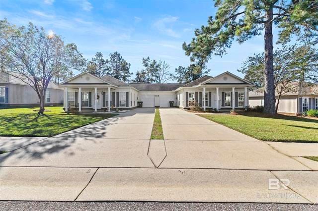 Street view - unit on the right with attached one-car garage - 33156B Stables Dr