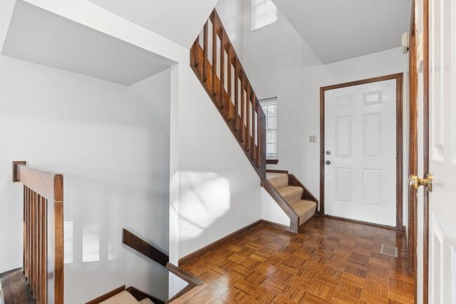 Building Photo - COMING SOON - Spacious 2-Bed, 3.5-Bath Townhouse with Stunning Lake Views